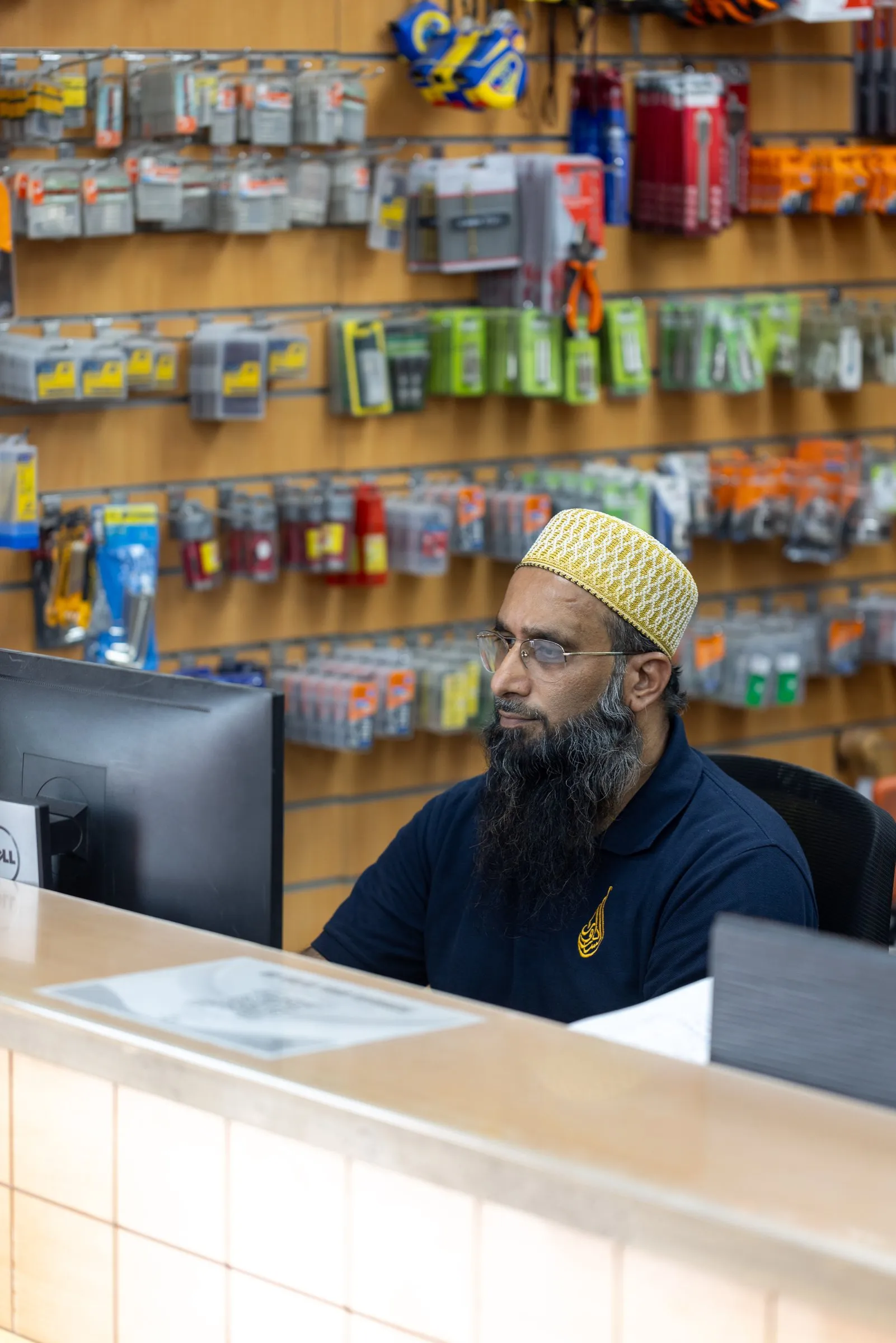 Serving a customer at the counter